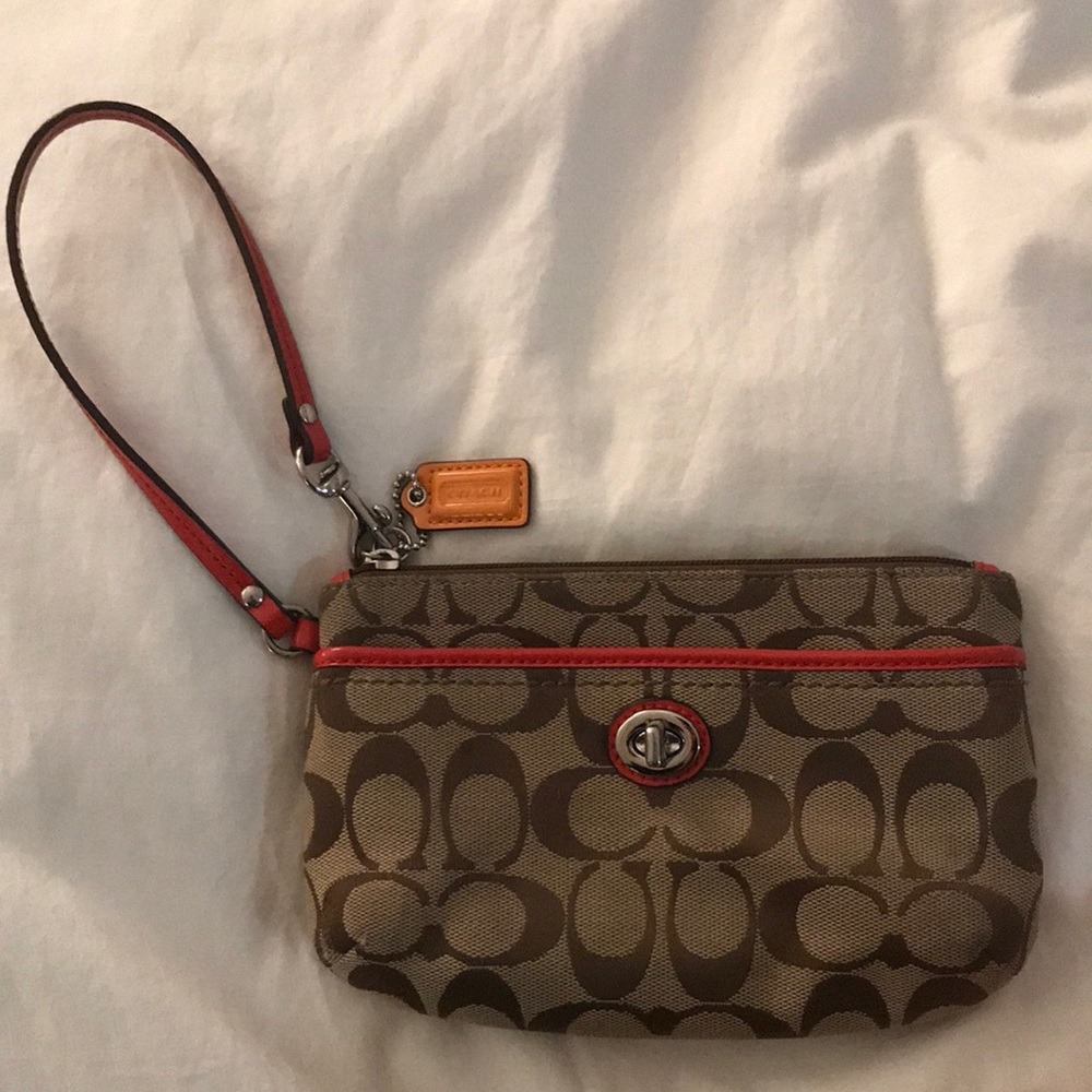 Coach wristlet with classic coach pattern
